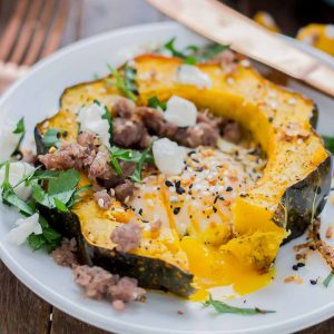 Everything Bagel Squash Egg in the Hole is the BEST breakfast sandwich but in fork and knife form.  Squash, egg, everything bagel seasoning, sausage and goat cheese, it's the ultimate egg in the hole. | Strawberry Blondie Kitchen