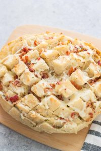 Warm up this season with Idahoan® Steakhouse® Soups and this delicious Cheddar Bacon Ranch Pull Apart Bread.  The perfect winning combination to keep cozy this season. | Strawberry Blondie Kitchen