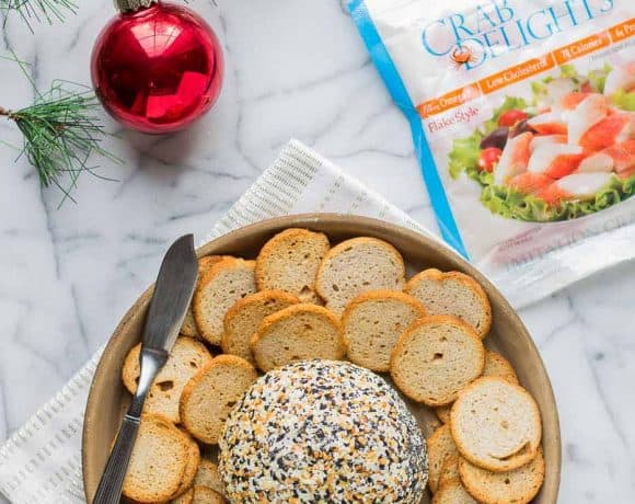 This Crab and Everything Bagel Cheese Ball is packed with crab, fresh herbs and rolled in everything bagel seasoning.  An appetizer worthy of your next get together! | Strawberry Blondie Kitchen