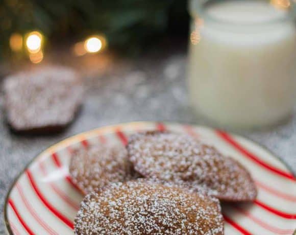 Gingerbread Madeleines are the perfect soft and buttery sponge cakes to send your tastebuds right into the holiday season! | Strawberry Blondie Kitchen