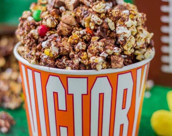 Rocky Road to Victory Popcorn is a game day lovers dream.  Rich chocolate, salty popcorn and bits of candy pieces make this popcorn mix a must have at your next home gate! | Strawberry Blondie Kitchen