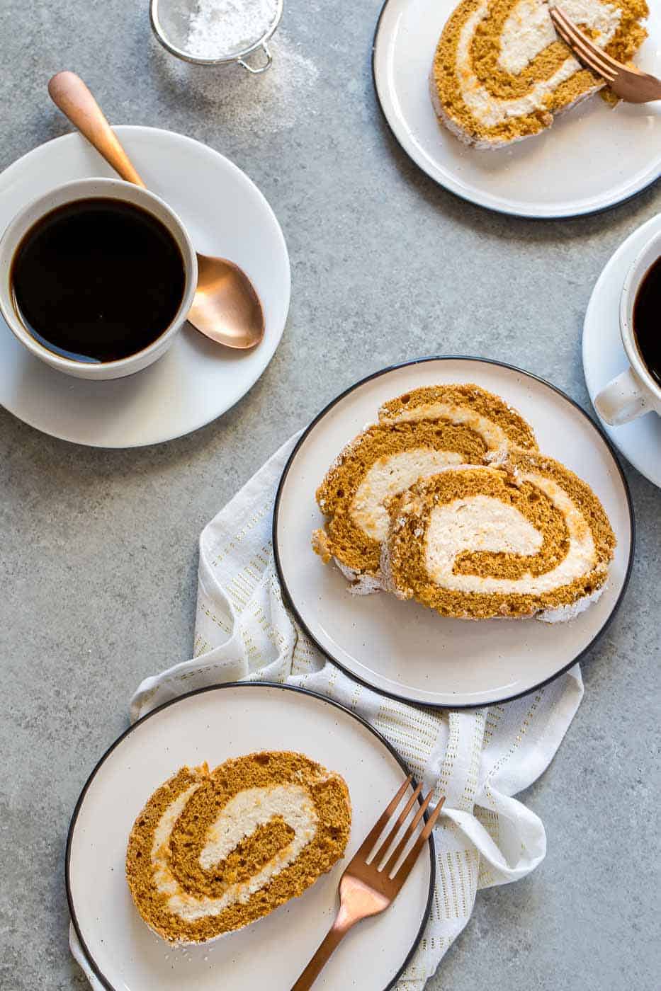 This Pumpkin Cake Roll with Cookie Butter Filling is a classic pumpkin cake roll but with an extra special filling.  It's the BEST pumpkin cake roll you'll ever have, promise! 