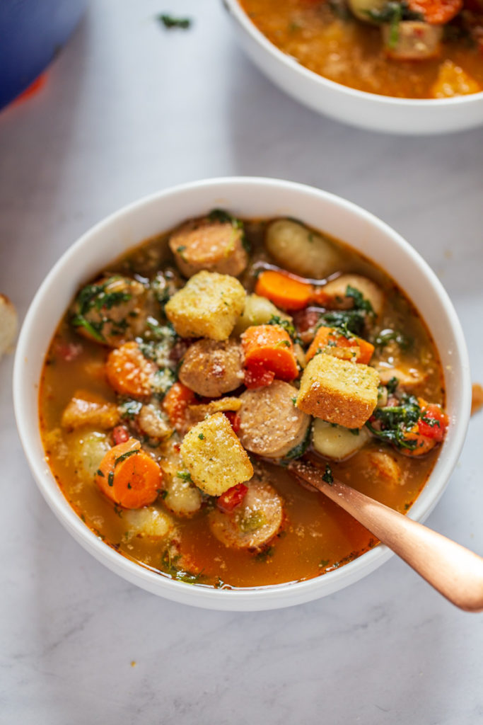 Close up photography shot of Italian Chicken Gnocchi Soup in a bowl