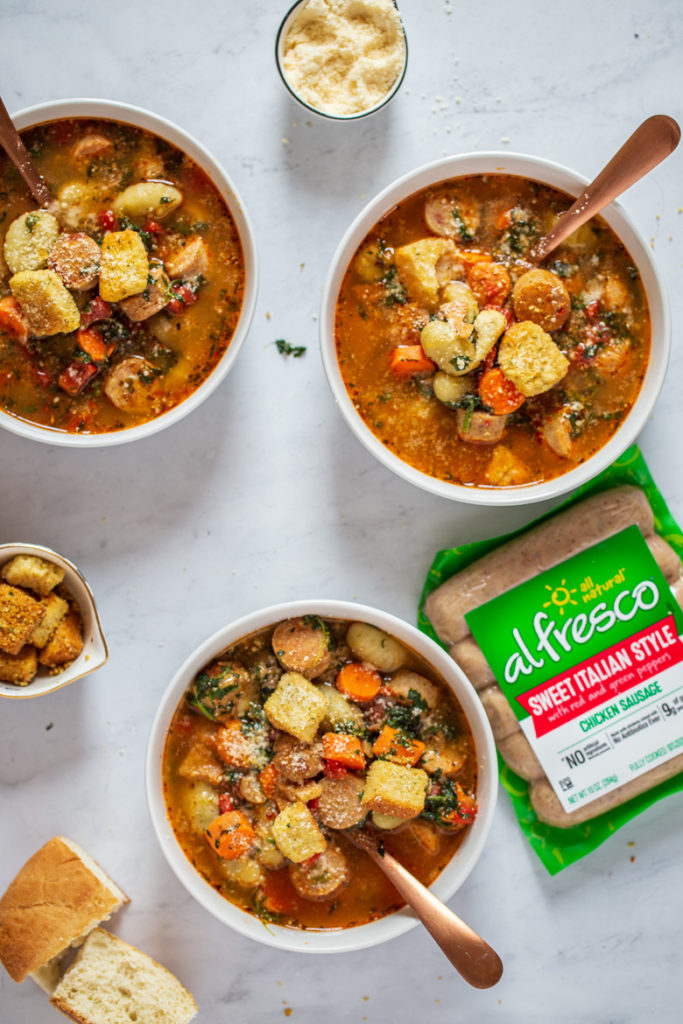 Italian Chicken Gnocchi Soup in bowls with al fresco Sweet Italian style chicken susages