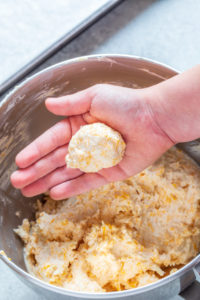 Using a small spoon, form mixture into 2-tablespoon-sized balls. Then shape into footballs