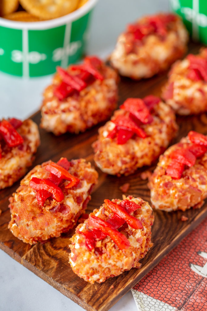 serving tray of horseradish cheesy cheeseball footballs