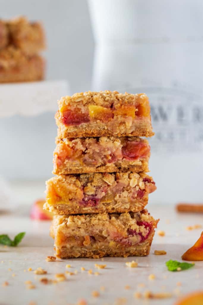 close up Stack of Peach Cobbler Crumble Bars