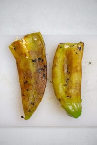Roasted Anaheim chiles after peeling off charred bits