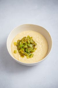 Ingredients in a bowl for roasted green chile cornbread