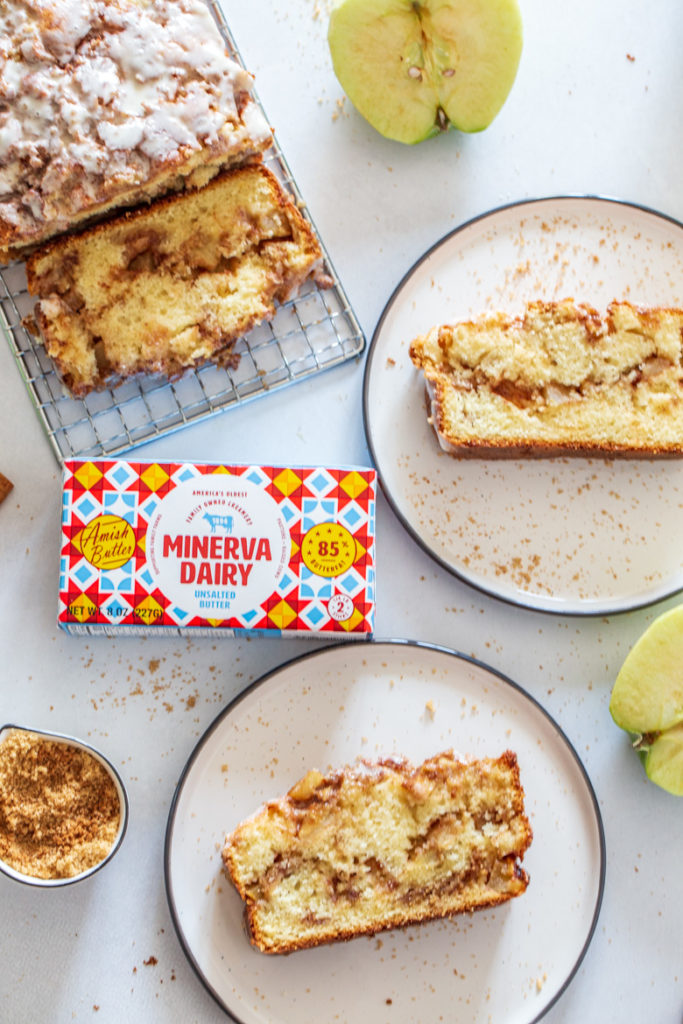 Oerhead photography shot of apple fritter bread with two slices and full loaf.