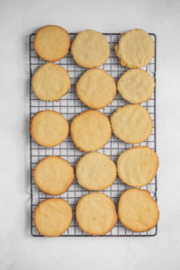 Peanut butter cookies on a drying rack