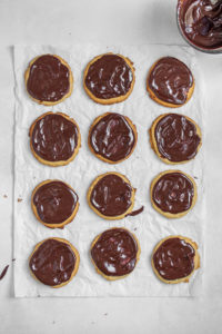 Peanut butter cookies with chocolate ganache on top.